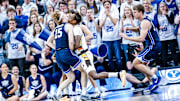 BYU basketball wing Richie Saunders suffers an injury against Wyoming