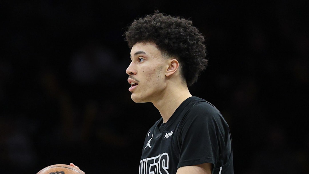 Feb 9, 2026; Brooklyn, New York, USA; Brooklyn Nets guard Nolan Traore (88) dribbles up court during the second half against the Chicago Bulls at Barclays Center. Mandatory Credit: Vincent Carchietta-Imagn Images