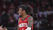 Feb 9, 2025; Houston, Texas, USA; Houston Rockets forward Cam Whitmore (7) and guard Jalen Green (4) celebrate after a play during the fourth quarter against the Toronto Raptors at Toyota Center. Mandatory Credit: Troy Taormina-Imagn Images
