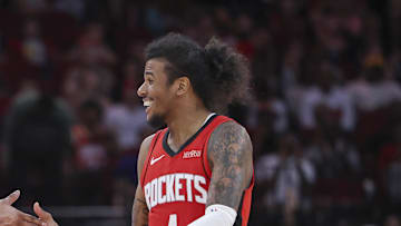 Feb 9, 2025; Houston, Texas, USA; Houston Rockets forward Cam Whitmore (7) and guard Jalen Green (4) celebrate after a play during the fourth quarter against the Toronto Raptors at Toyota Center. Mandatory Credit: Troy Taormina-Imagn Images