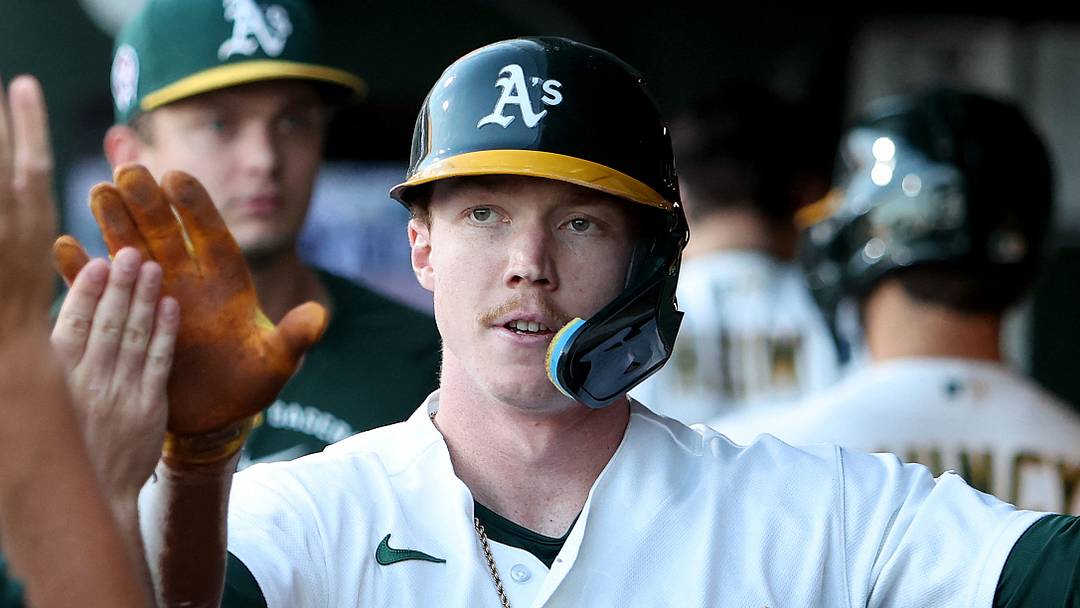 Sep 11, 2026; West Sacramento, California, USA;  Athletics center fielder Henry Bolte (33) celebrates with teammates in the dugout after scoring a run against the Seattle Mariners during the first inning at Sutter Health Park.  Mandatory Credit: Dennis Lee-Imagn Images