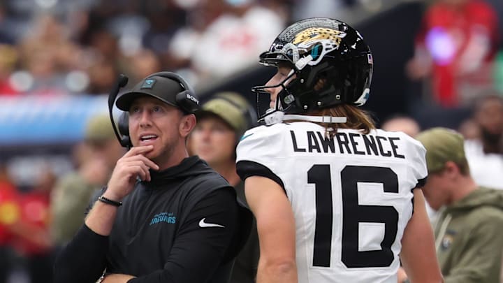 Nov 9, 2025; Houston, Texas, USA; Jacksonville Jaguars head coach Liam Coen and quarterback Trevor Lawrence (16) on the sidelines during the first half against the Houston Texans at NRG Stadium. Mandatory Credit: Thomas Shea-Imagn Images
