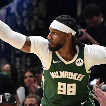 Apr 21, 2024; Milwaukee, Wisconsin, USA; Milwaukee Bucks forward Jae Crowder (99) reacts after scoring a basket in the third quarter against the Indiana Pacers during game one of the first round for the 2024 NBA playoffs at Fiserv Forum. Mandatory Credit: Benny Sieu-Imagn Images