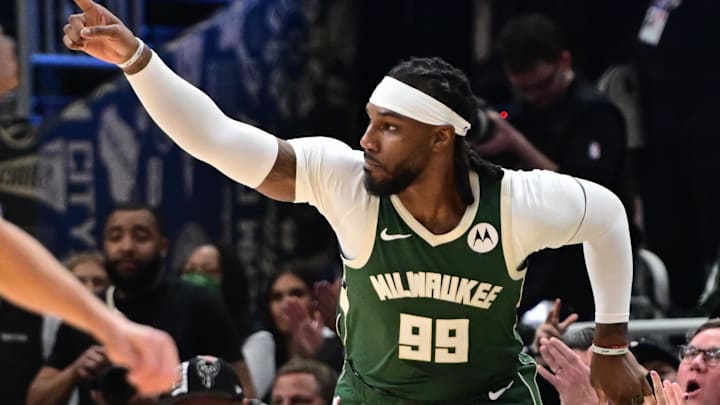 Apr 21, 2024; Milwaukee, Wisconsin, USA; Milwaukee Bucks forward Jae Crowder (99) reacts after scoring a basket in the third quarter against the Indiana Pacers during game one of the first round for the 2024 NBA playoffs at Fiserv Forum. Mandatory Credit: Benny Sieu-Imagn Images