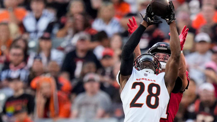 Cincinnati Bengals cornerback Josh Newton (28) intercepts a pass in the second quarter of the NFL Preseason Week 1 game between the Cincinnati Bengals and the Tampa Bay Buccaneers at Paycor Stadium in downtown Cincinnati on Saturday, Aug. 10, 2024.