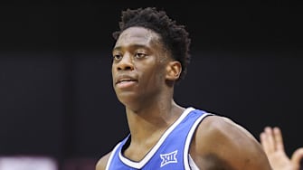 Nov 28, 2025; Kissimmee, FL, USA; Brigham Young University Cougars forward AJ Dybantsa (3) reacts after making a three point basket against the Dayton Flyers in the second half during the ESPN Events Invitational at State Farm Field House. Mandatory Credit: Nathan Ray Seebeck-Imagn Images