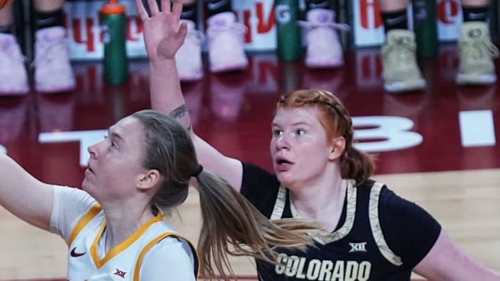 Iowa State Cyclones' guard Emily Ryan (11) shoots the ball over around Colorado Buffaloes's forward Tabitha Betson (17) during the second quarter in the Big-12 women’s basketball at Hilton Coliseum on Saturday, Feb. 8, 2025, in Ames, Iowa. Iowa State Cyclones' guard Emily Ryan (11) shoots the ball over around Colorado Buffaloes's forward Tabitha Betson (17) during the second quarter in the Big-12 women’s basketball at Hilton Coliseum on Saturday, Feb. 8, 2025, in Ames, Iowa.