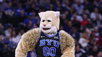 Mar 27, 2025; Newark, NJ, USA; Brigham Young Cougars mascot Cosmo the Cougar performs during an East Regional semifinal of the 2025 NCAA tournament against the Alabama Crimson Tide at Prudential Center. Mandatory Credit: Vincent Carchietta-Imagn Images