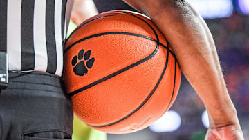 A referee holds a ball with a Clemson logo in a time out period during the first half at Littlejohn Coliseum Tuesday, Feb 8, 2022