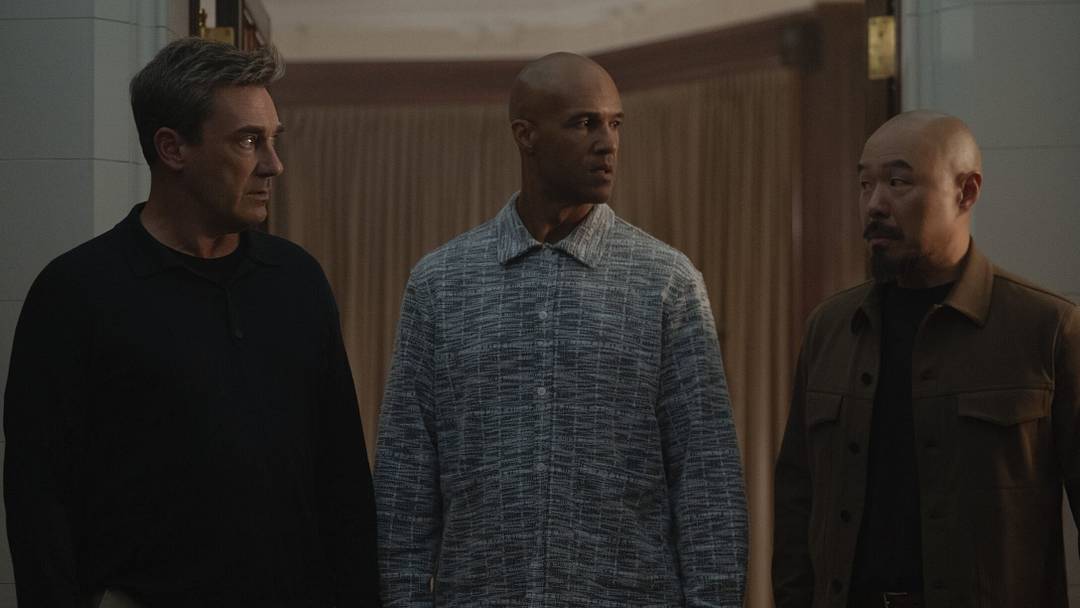 Jon Hamm, Mark Tallman and Hoon Lee in "Your Friends & Neighbors," now streaming on Apple TV
