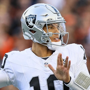 Nov 3, 2024; Cincinnati, Ohio, USA; Las Vegas Raiders quarterback Desmond Ridder (10) throws a pass against the Cincinnati Bengals in the second half at Paycor Stadium. Mandatory Credit: Katie Stratman-Imagn Images