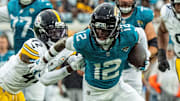 Travis Hunter made his debut at wide receiver and cornerback for the Jaguars on Saturday.