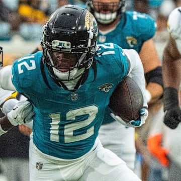 Travis Hunter made his debut at wide receiver and cornerback for the Jaguars on Saturday.