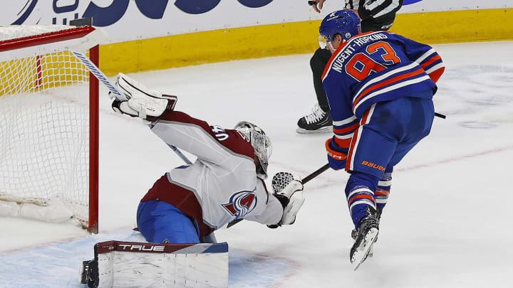 Colorado Avalanche goaltender Alexander Georgiev (40) makes a save on Edmonton Oilers Ryan Nugent-Hopkins (93)