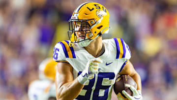 Mason Taylor 86 runs the ball as the LSU Tigers take on the Ole Miss Rebels at Tiger Stadium in Baton Rouge, Louisiana, on Oct. 12, 2024