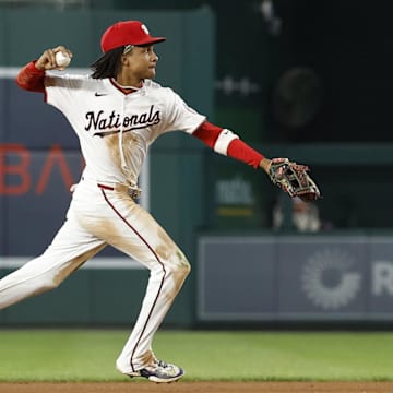 Sep 12, 2024; Washington, District of Columbia, USA; Washington Nationals shortstop CJ Abrams (5) makes a throw to first base after fielding a ground ball by Miami Marlins outfielder Cristian Pache (not pictured) during the fourth inning at Nationals Park.