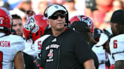 Sep 20, 2025; Durham, North Carolina, USA;  NC State Wolfpack head coach Dave Doeren during the second quarter against the Duke Blue Devils at Wallace Wade Stadium. Mandatory Credit: Zachary Taft-Imagn Images