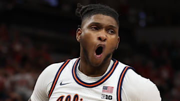 Mar 17, 2024; Minneapolis, MN, USA; Illinois Fighting Illini forward Dain Dainja (42) celebrates in the second half against the Wisconsin Badgers at Target Center. Mandatory Credit: Matt Krohn-Imagn Images