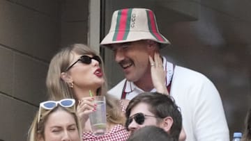 Sep 8, 2024; Flushing, NY, USA; Recording artist Taylor Swift and Kansas City Chiefs tight end Travis Kelce talk during the men’s singles final of the 2024 U.S. Open tennis tournament at USTA Billie Jean King National Tennis Center. 