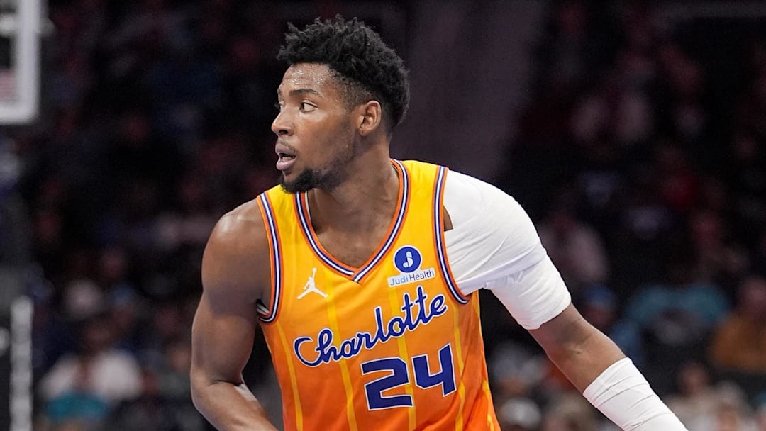 Jan 24, 2026; Charlotte, North Carolina, USA;  Charlotte Hornets forward Brandon Miller (24) brings the ball up court against the Washington Wizards during the second half at the Spectrum Center. Mandatory Credit: Jim Dedmon-Imagn Images