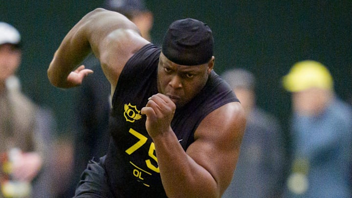 Oregon offensive lineman Emmanuel Pregnon runs drills during Oregon Pro Day on March 17, 2026, at the Moshofsky Center in Eugene, Oregon.