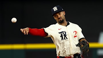 Texas Rangers second baseman Marcus Semien (2) throws to first base during the seventh inning against the Philadelphia Phillies at Globe Life Field.