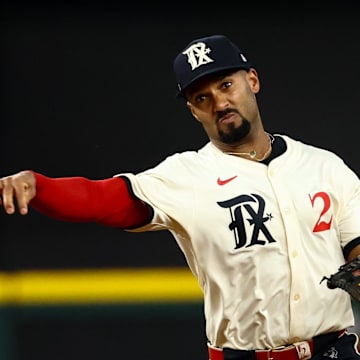 Texas Rangers second baseman Marcus Semien (2) throws to first base during the seventh inning against the Philadelphia Phillies at Globe Life Field.