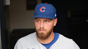 Sep 16, 2025; Pittsburgh, Pennsylvania, USA;  Chicago Cubs first baseman Michael Busch (29) enters the dugout against the Pittsburgh Pirates at PNC Park. Mandatory Credit: Charles LeClaire-Imagn Images