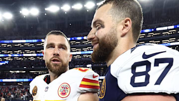 Nov 27, 2025; Arlington, Texas, USA; Kansas City Chiefs tight end Travis Kelce (87) and Dallas Cowboys tight end Jake Ferguson (87) talk after the game at AT&T Stadium. Mandatory Credit: Kevin Jairaj-Imagn Images