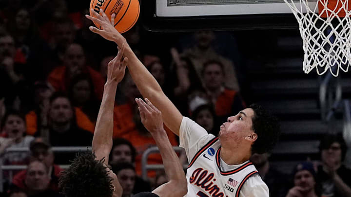 Illinois forward Will Riley (7) blocks Xavier guard Dailyn Swain (3) during the second half of their first round NCAA men’ s basketball tournament game on Friday March 21, 2025 at Fiserv Forum in Milwaukee, Wis. Illinois forward Will Riley (7) blocks Xavier guard Dailyn Swain (3) during the second half of their first round NCAA men’ s basketball tournament game on Friday March 21, 2025 at Fiserv Forum in Milwaukee, Wis.