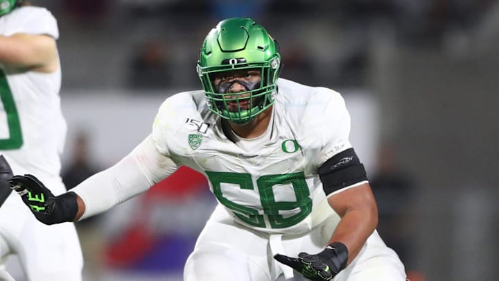 Oregon's first Outland Trophy winner and a first-round draft pick, Penei Sewell is an immediate starter on the Oregon all-time team. Mandatory Credit: Mark J. Rebilas-Imagn Images