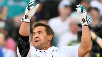 Former MLB All-Star Bret Boone hits a home run