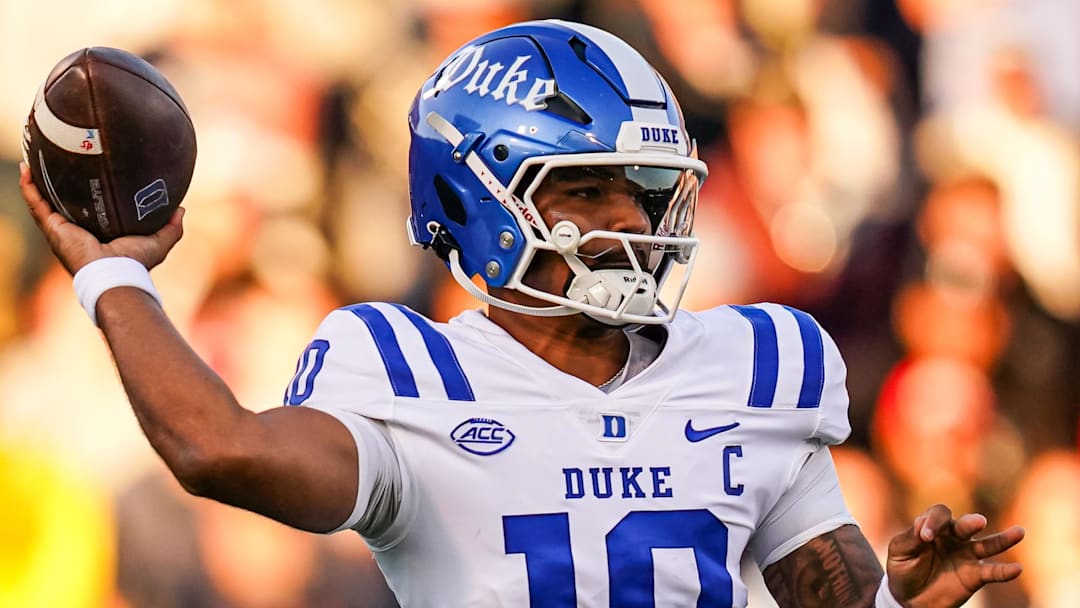 Nov 8, 2025; East Hartford, Connecticut, USA; Duke Blue Devils quarterback Darian Mensah (10) throws a pass against the UConn Huskies in the first quarter at Pratt & Whitney Stadium at Rentschler Field. Mandatory Credit: David Butler II-Imagn Images