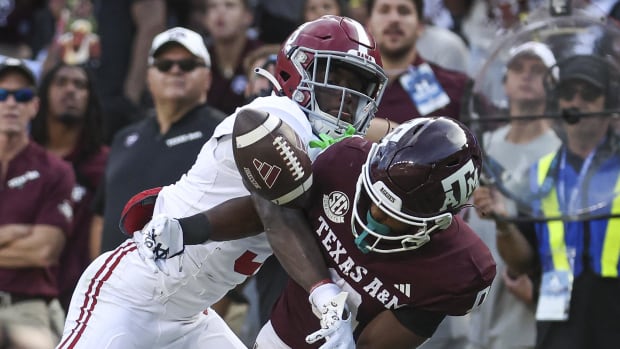Alabama Crimson Tide defensive back Terrion Arnold breaks up a pass at Texas A&M.