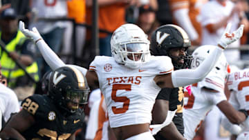 Texas Longhorns defensive back Malik Muhammad (5) celebrates a Vanderbilt stop during the first half of their game at FirstBank Stadium in Nashville, Tenn., Saturday, Oct. 26, 2024.