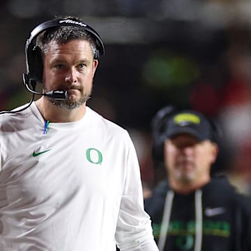 Oct 18, 2025; Piscataway, New Jersey, USA; Oregon Ducks head coach Dan Lanning looks on during the first half against the Rutgers Scarlet Knights at SHI Stadium. Mandatory Credit: Vincent Carchietta-Imagn Images