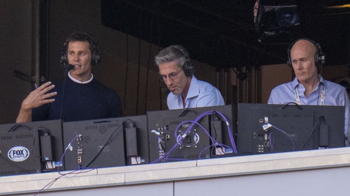 Brady (left) calls a practice game on Sunday, Aug. 18.