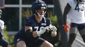 Jul 23, 2025; Lake Forest, IL, USA; Chicago Bears guard Theo Benedet (79) stretches during training camp at Halas Hall.