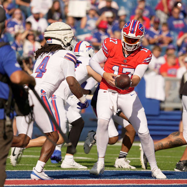 Josh Allen hands off