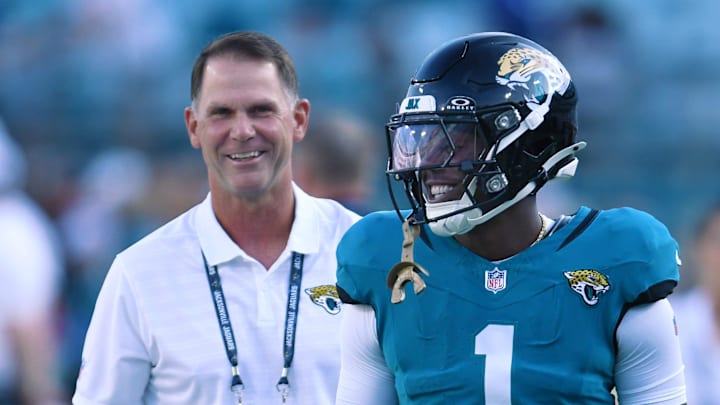 Jaguars general manager Trent Baalke and Travis Etienne Jr. talk before a Jaguars’ preseason game. Jaguars general manager Trent Baalke and Travis Etienne Jr. talk before a Jaguars’ preseason game.