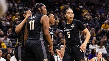 Vanderbilt women's basketball players gather together during a break in Sunday's game against Missouri that the Commodores won 100-59.