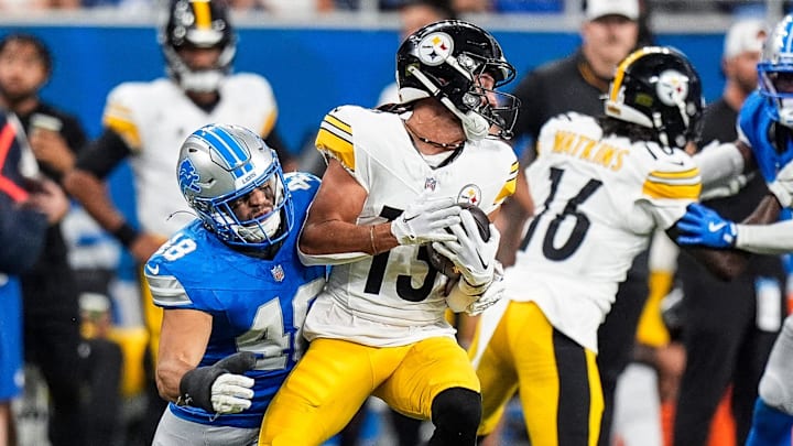 Detroit Lions safety Loren Strickland (48) tackles Pittsburgh Steelers wide receiver Scotty Miller (13) during the first half of a preseason game at Ford Field in Detroit on Saturday, August 24, 2024.