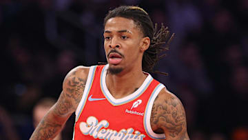 Jan 27, 2025; New York, New York, USA; Memphis Grizzlies guard Ja Morant (12) dribbles up court during the first half against the Memphis Grizzlies at Madison Square Garden. Mandatory Credit: Vincent Carchietta-Imagn Images