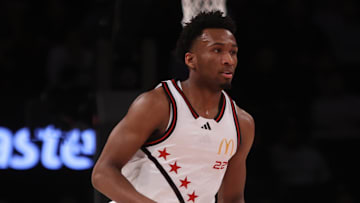 Apr 1, 2025; Brooklyn, NY, USA; McDonald's All American West guard Darryn Peterson (22) dribbles the ball against McDonald's All American East during the first half of the game at Barclays Center. Mandatory Credit: Pamela Smith-Imagn Images
