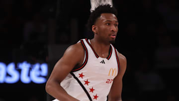 Apr 1, 2025; Brooklyn, NY, USA; McDonald's All American West guard Darryn Peterson (22) dribbles the ball against McDonald's All American East during the first half of the game at Barclays Center.