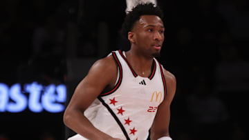 Apr 1, 2025; Brooklyn, NY, USA; McDonald's All American West guard Darryn Peterson (22) dribbles the ball against McDonald's All American East during the first half of the game at Barclays Center. Mandatory Credit: Pamela Smith-Imagn Images