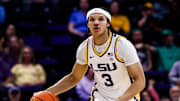 Feb 8, 2025; Baton Rouge, Louisiana, USA;  LSU Tigers guard Curtis Givens III (3) dribbles against the Mississippi Rebels during the first half at Pete Maravich Assembly Center. Mandatory Credit: Stephen Lew-Imagn Images