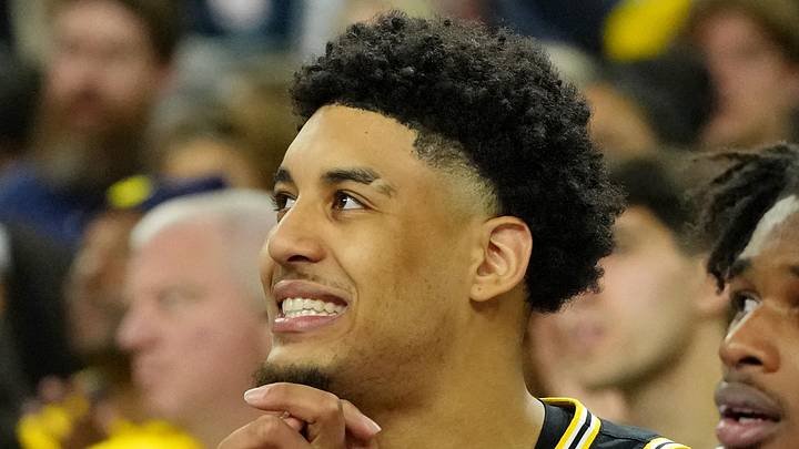 Apr 4, 2026; Indianapolis, IN, USA; Michigan Wolverines forward Yaxel Lendeborg (23) reacts on the bench during the second half in a semifinal of the Final Four of the men's 2026 NCAA Tournament at Lucas Oil Stadium. Mandatory Credit: Bob Donnan-Imagn Images