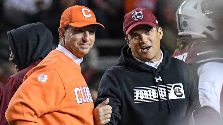 Clemson head coach Dabo Swinney and South Carolina Head Coach Shane Beamer talk before the game at Williams Brice Stadium in Columbia, South Carolina Saturday, November 27, 2021.