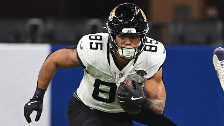 Jan 5, 2025; Indianapolis, Indiana, USA; Indianapolis Colts cornerback Jaylon Jones (40) grabs the jersey of Jacksonville Jaguars tight end Brenton Strange (85) in an attempt to tackle during the second half at Lucas Oil Stadium. Mandatory Credit: Marc Lebryk-Imagn Images Jan 5, 2025; Indianapolis, Indiana, USA; Indianapolis Colts cornerback Jaylon Jones (40) grabs the jersey of Jacksonville Jaguars tight end Brenton Strange (85) in an attempt to tackle during the second half at Lucas Oil Stadium. Mandatory Credit: Marc Lebryk-Imagn Images